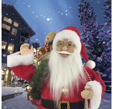 Dekorativer Weihnachtsmann mit Geschenken in einer verschneiten Szene.