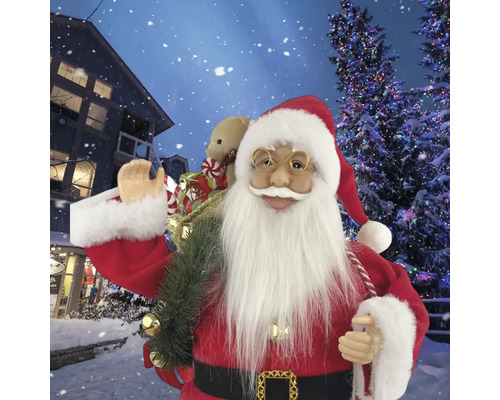 Dekorativer Weihnachtsmann mit Geschenken in einer verschneiten Szene.