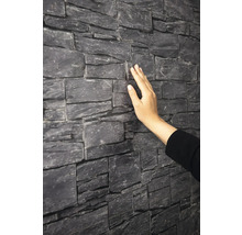 Wandverkleidung in Steinoptik mit Hand