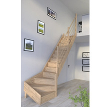 Holztreppe in einem hellen Wohnraum mit Bildern an der Wand