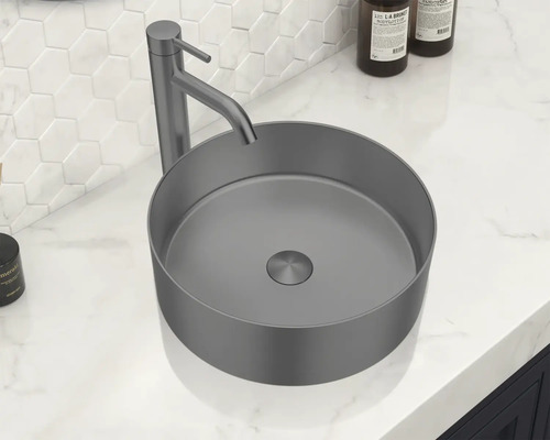 Aufbauwaschbecken mit Armatur auf Waschtisch