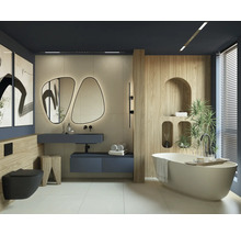 Modernes Badezimmer mit freistehender Badewanne, Waschtisch, Spiegel und Toilette.