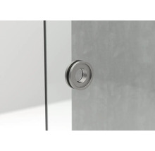 Runder Türgriff aus Metall an einer Glastür