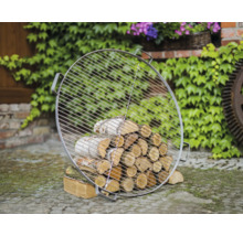 Runder Grillrost aus Metall mit Brennholz