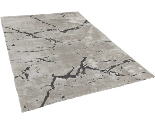 Grauer Teppich mit abstraktem Muster