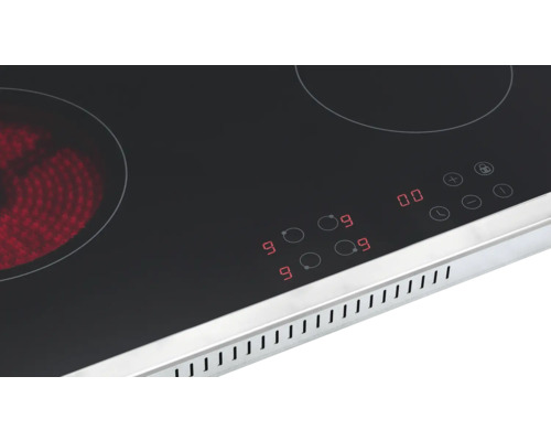 Detailansicht eines Induktionskochfeldes mit digitalen Bedienelementen