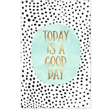 Dekoration mit der Aufschrift ''Heute ist ein guter Tag'' und Punktmuster