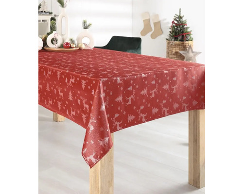 Rot karierte Wachstuchtischdecke mit Weihnachtsmotiven auf einem Tisch