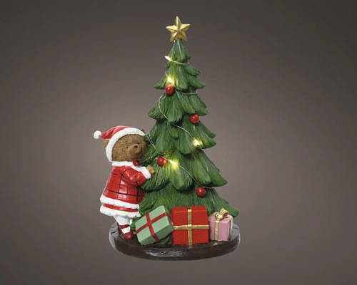 Dekorativer Weihnachtsschmuck: Bär schmückt Tannenbaum mit Geschenken