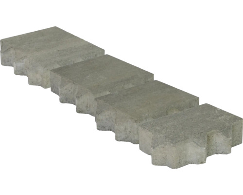 Vier graue Pflastersteine aus Beton