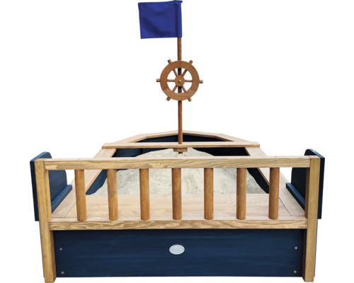 Sandkasten in Bootsform mit Steuerrad und Fahne