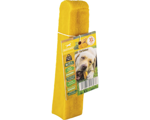 Gelber Hundeknochen aus Kuhmilch mit Kurkuma auf der Verpackung