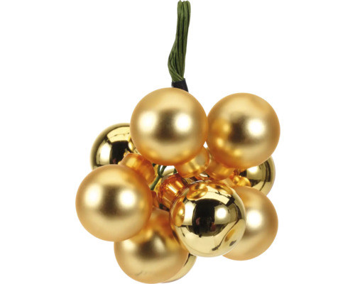 Goldene Christbaumkugeln am Strang zur Dekoration