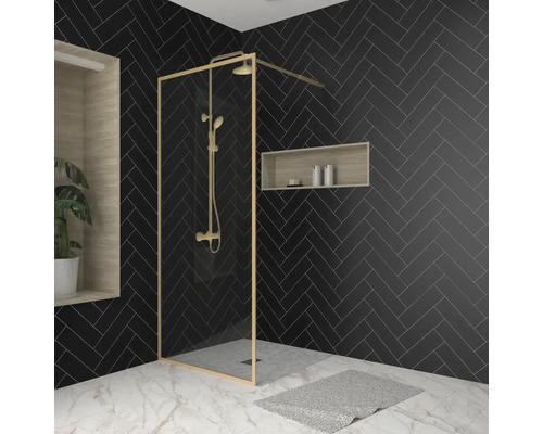 Raumdusche Aurlane Golden Edge 900x2000 mm Echtglas Klar hell gold Reversibel Modernes Badezimmer mit ebenerdiger Dusche und dunklen Ziegelwandfliesen im Fischgrätmuster.