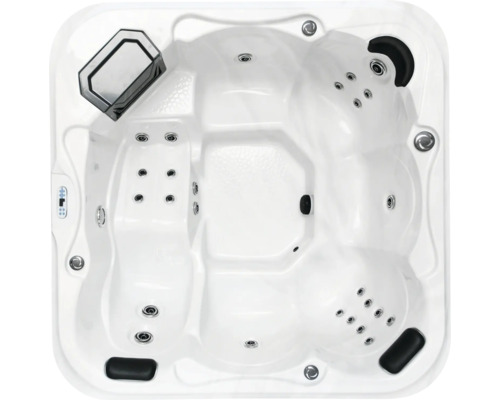 Aufnahme von oben eines Whirlpools mit mehreren Sitzen und Düsen