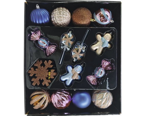 Verpackung mit verschiedenen Weihnachtsbaumschmucken, darunter Kugeln, Lebkuchenmann und Bonbonformen