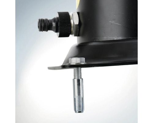 Detailansicht eines Befestigungselements an einem schwarzen Metallobjekt