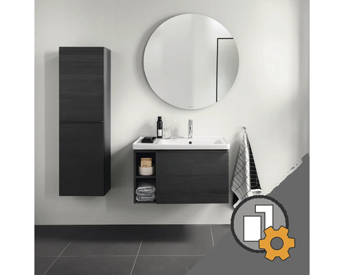 Badezimmer mit Waschbeckenunterschrank, Hochschrank und rundem Spiegel