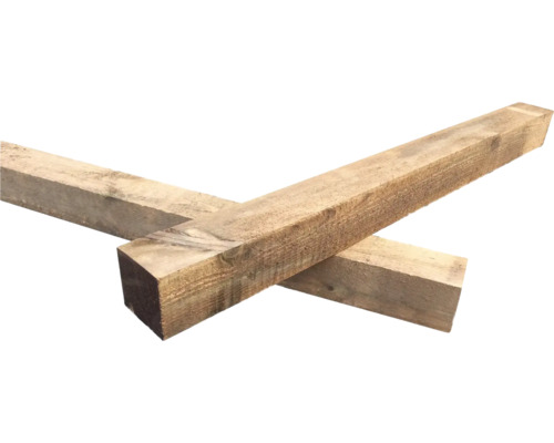 Zwei Holzbalken liegen übereinander.