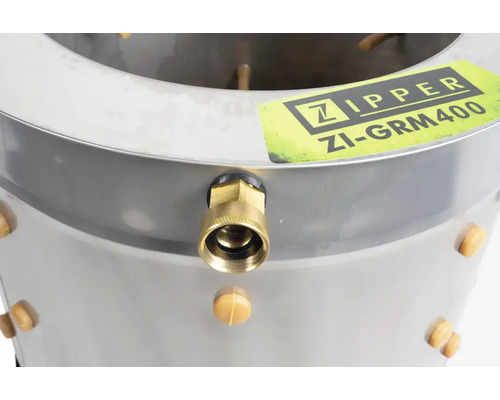 Detailansicht einer Rupfmaschine mit Wasseranschluss und Zipper Logo.