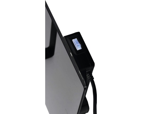 Detailansicht eines Heizkörpers mit Ein- und Ausschalter