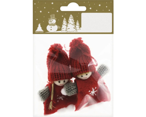 Zwei Weihnachtsbaumfiguren in einer Verpackung.