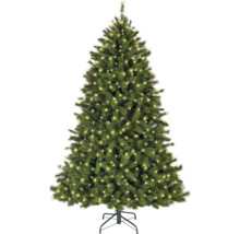 Geschmückter künstlicher Weihnachtsbaum mit Lichtern auf einem Ständer