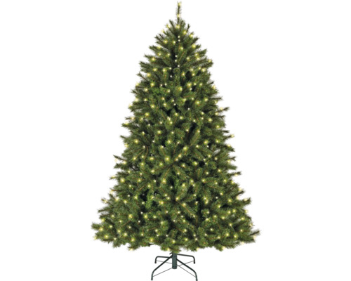 Geschmückter künstlicher Weihnachtsbaum mit Lichtern auf einem Ständer