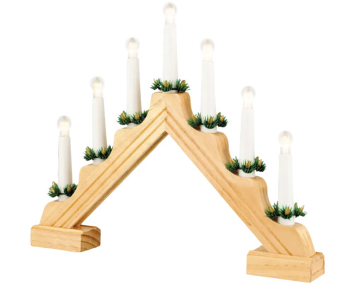 Schwibbogen aus Holz mit elektrischen Kerzen und Tannengrün