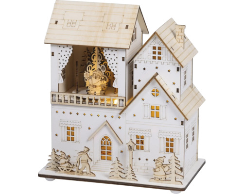 Weihnachtliches, beleuchtetes Holzhaus mit Weihnachtsmann