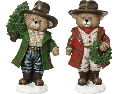 Zwei Bärenfiguren mit Hut und Winterkleidung, eine hält einen Weihnachtsbaum, die andere einen Kranz