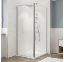 Eckdusche mit Duschwanne und Armatur in einem hellen Badezimmer