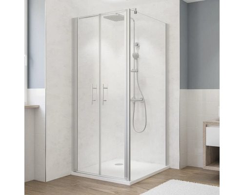 Eckdusche mit Duschwanne und Armatur in einem hellen Badezimmer