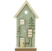Dekoratives Holzhaus mit Hirsch und Tannenbaum für Weihnachten