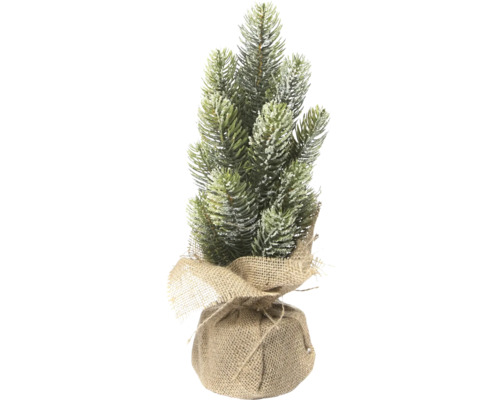 Kleiner, künstlicher Weihnachtsbaum im Jutesack
