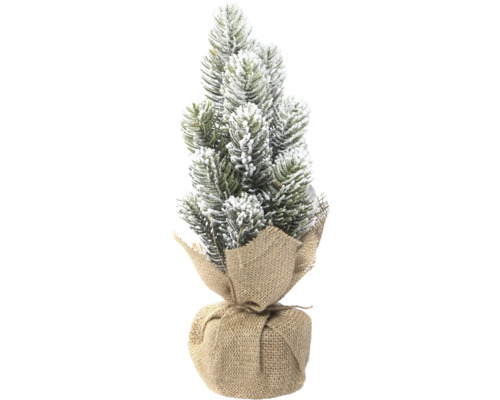 Dekorativer Miniatur-Weihnachtsbaum mit Schnee und Jutestoff