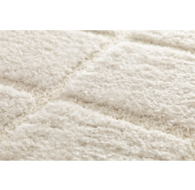 Detailansicht eines Teppichs mit geometrischem Muster