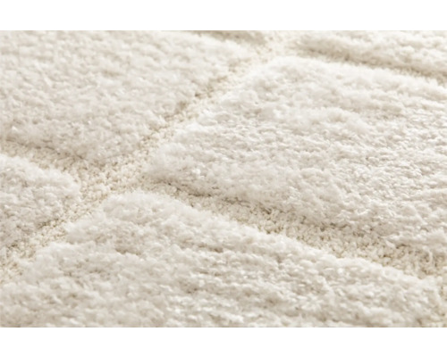 Detailansicht eines Teppichs mit geometrischem Muster