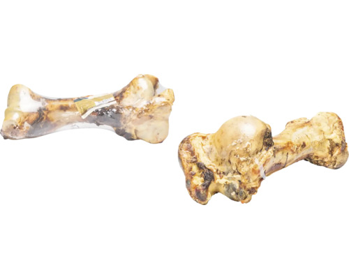 Zwei Rinderknochen, einer davon in Folie verpackt, für Hunde