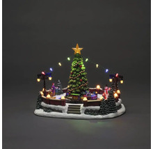 Weihnachtsdorf mit Weihnachtsbaum, Figuren, Beleuchtung und Dekoration