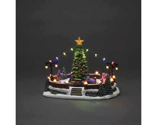 Weihnachtsdorf mit Weihnachtsbaum, Figuren, Beleuchtung und Dekoration