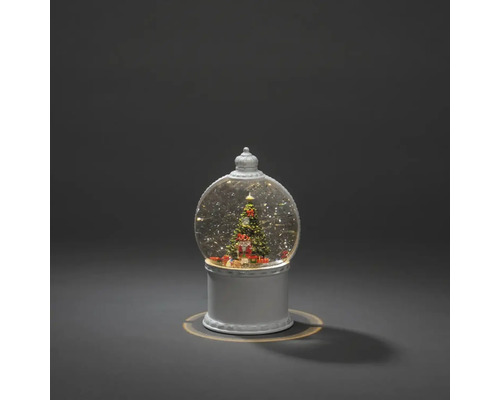 Schneekugel mit Weihnachtsbaum und Geschenken
