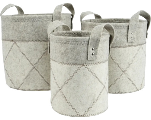 Drei graue Filzkörbe mit Griffen