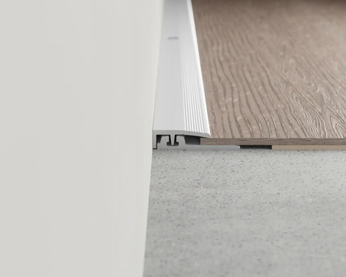 Übergangsprofil zwischen Wand und Bodenbelag