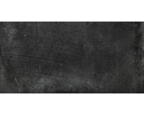 Dunkle Zementfliese mit matter Oberfläche