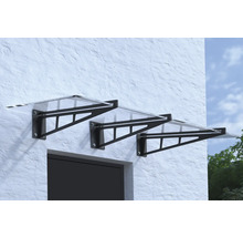 Mehrere Haustürvordächer aus Acrylglas mit Halterung an einer Fassade