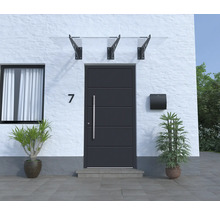 Eingangsbereich eines Hauses mit Haustür, Briefkasten und Vordach