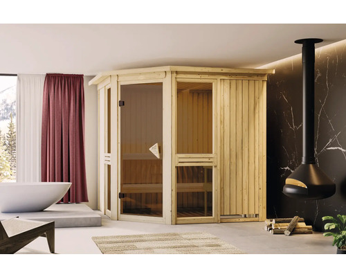 Elementsauna Karibu Omelia inkl.9 kW Bio Ofen u.ext.Steuerung mit Dachkranz und brobzierter Ganzglastür Innensauna aus Holz mit Glaselementen in einem Badezimmer mit Badewanne und Kaminofen