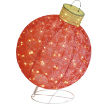 Dekorative Weihnachtsbaumkugel mit Schneeflockenmuster und Beleuchtung auf einem Ständer