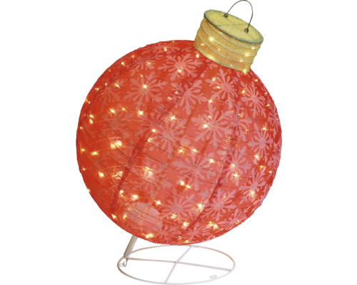 Dekorative Weihnachtsbaumkugel mit Schneeflockenmuster und Beleuchtung auf einem Ständer